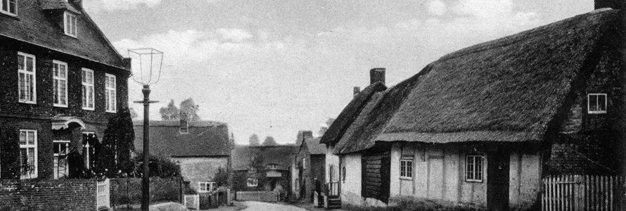 Old postcard of thatched cottages at Soulbury, Buckinghamshire, circa 1900