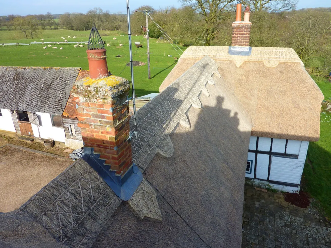 View from the ridge of a newly thatched roof at Stockgrove