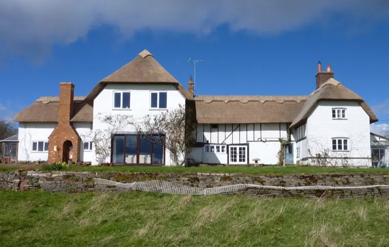 White house and timber-framed range